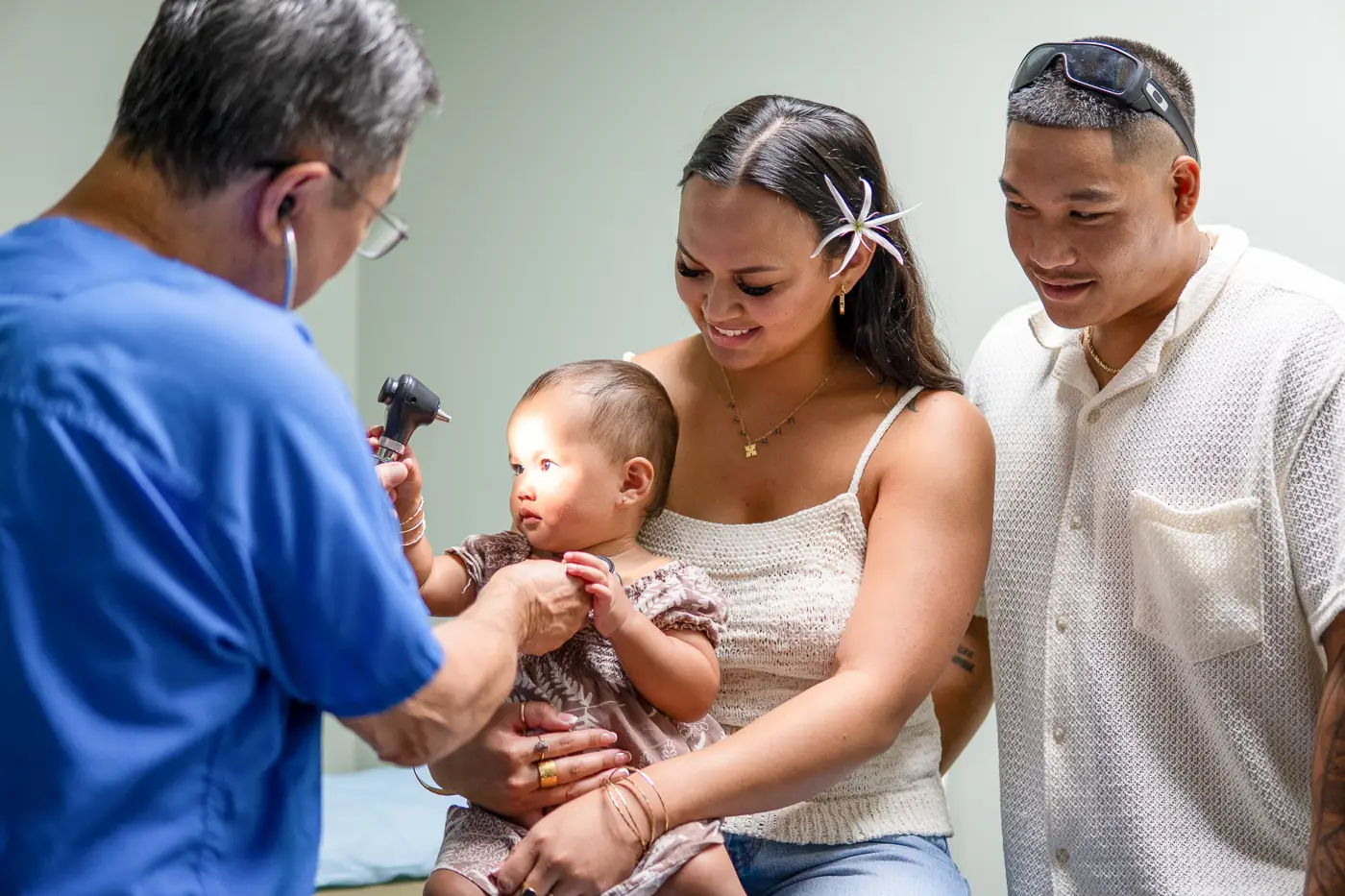 doctor checking toddler eye movement